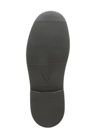 Suola nera con scanalature orizzontali e verticali, caratterizzata da un logo "V" in rilievo al centro e un'area del tallone liscia e arrotondata.