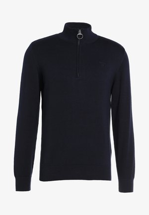 Sötétkék félcipzáros pulóver kötött anyagból, magas gallérral, bordázott mandzsettával és visszafogott logóval a mellkasán.