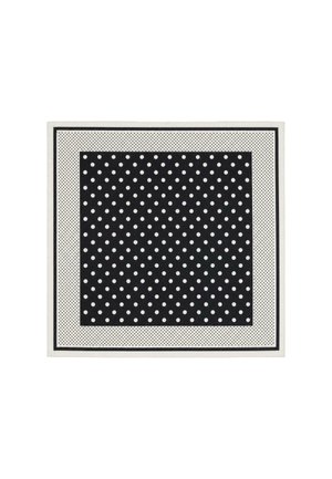 Foulard quadrato a pois bianco e nero con pois bianchi più grandi al centro nero e pois neri più piccoli sul bordo bianco.