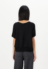 DRYKORN SOMELI - T-shirts - black