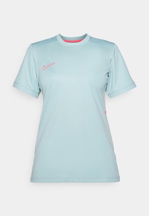 Světle modré sportovní tričko s krátk�ými rukávy, kulatým výstřihem a růžovým logem Nike na prsou. Hladká, na vlhkost odpudivá tkanina.