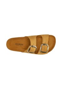 Braune Leder-Sandalen mit zwei verstellbaren Riemen, silbernen Schnallen und einem strukturierten Fußbett für Komfort. Markenname "wojas" innen gedruckt.