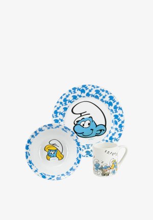 Three-piece Smurfs dish set: large plate with blue accents and Smurf face, bowl with blue trim and Smurfette, white mug featuring Smurfs design.