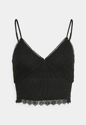 Czarny koronkowy bralette z cienkimi, regulowanymi ramiączkami, dekoltem w serek i falistą koronkową lamówką przy krawędzi.