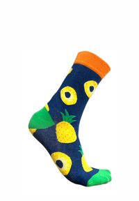 Chaussettes navy avec des ananas jaunes et des accents verts, dotées d'un poignet côtelé orange et d'une finition texturée pour une meilleure adhérence.