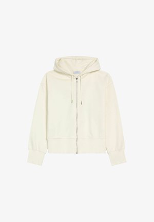 Krótkia, kremowa bluza z kapturem, z zapięciem na zamek z przodu, sznurkiem w kapturze, ściągaczami przy rękawach i gładką teksturą. Prosty design, bez wzorów czy ozdób.