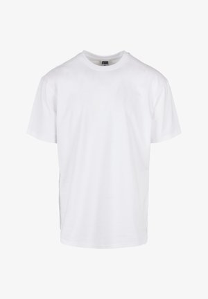 Witte katoenen t-shirt met korte mouwen, ronde halslijn, een ruime pasvorm en rechte zoom. Geen zichtbare patronen of accenten.