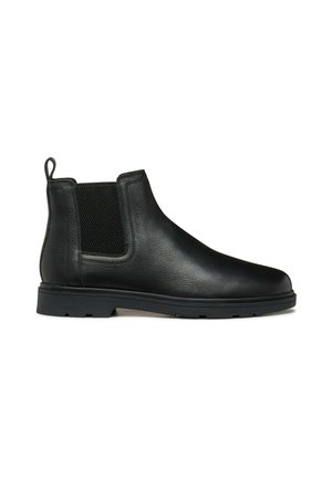 Las botas Chelsea de cuero negro presentan una parte superior lisa, paneles laterales elásticos y una suela de goma resistente para ofrecer agarre y durabilidad.