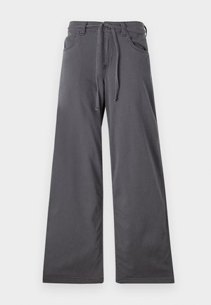 Grijze brede broek gemaakt van gladde stof, met een elastiche tailleband, voorzakken en een rechte pasvorm.