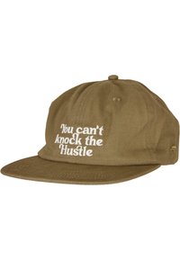 Brown cotton cap with a flat brim, featuring white embroidered text saying "You can't knock the Hustle" on the front.
