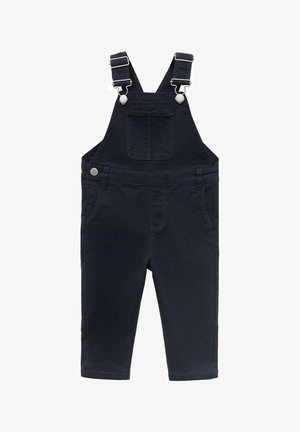 Navy blue overalls made of cotton, featuring adjustable straps, front pocket, and side pockets. Slim, tapered leg design.