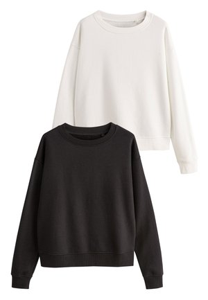 Due felpe a manica lunga con scollo tondo, una bianca e una nera, mostrate distese senza motivi o loghi.