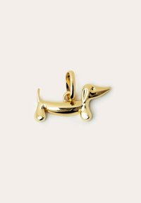 Goldfarbener Anhänger in Form eines Dachshunds, mit sanften Kurven, einem runden Augendetail und einer strukturierten Oberfläche am Körper.