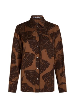 Barna, gombos ing, sötétbarna levélmintával, hegyes gallérral és hosszú ujjal, gombos mandzsettával.