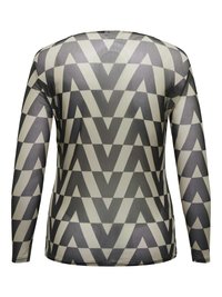 Long-sleeve top in sheer fabric featuring a black and cream zigzag pattern, round neckline, and fitted silhouette with minimal stitching details.