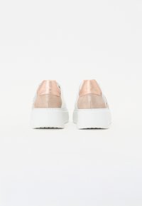 White sneakers with a glossy rose gold heel accent, smooth texture, rounded shape, and a thick white sole. Minimalistic design.