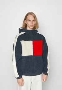 Tommy Jeans REVERSIBLE JACKET - Välikausitakki - twilight navy/multi
