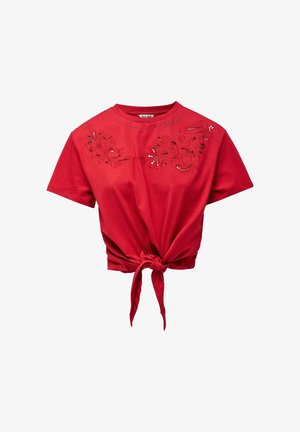Red short-sleeve crop top with floral cutout embroidery on chest and a front tie knot at the hem.