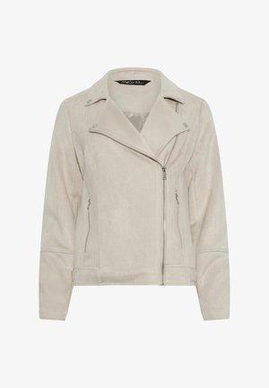 Licht beige suède bikerjack met asymmetrische ritssluiting aan de voorkant, brede revers, zilveren drukkers en ritssluitingen aan de zijkanten.