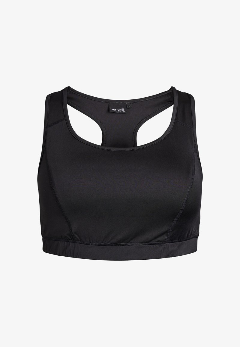 Mustkas sportbra, mis on valmistatud siledast ja venivast kangast. Omab võidusõidukuue disaini ja istuvat siluetti. Õmblused on siledateks mugavuse huvides.