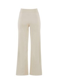 Pantaloni beige a gamba larga realizzati in tessuto a coste, con una vita alta elasticizzata e una texture morbida, che offrono una vestibilità rilassata e comoda.