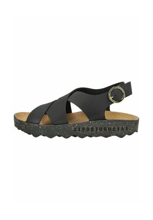 Zwarte sandaal met kruislussen, kurken voetbed en gestructureerde zool. Beschikt over een ronde metalen hardware-accent en een achterband voor ondersteuning.