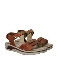 Brown leather sandals with braided straps, adjustable buckles, cushioned footbed, and a lightweight, contoured outsole for comfort.