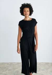 LASCANA OVERALL CULOTTE FRONT TWIST - Paplūdimio reikmuo - schwarz