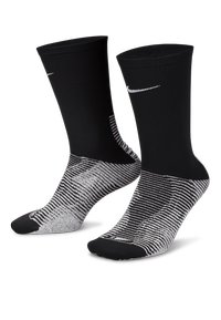 Svarte sportssokker med ribbet tekstur, med en hvit Nike-logo og et grått stripemønster rundt fotområdet.