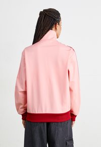 adidas Originals FIREBIRD - Chaqueta outdoor - semi pink spark