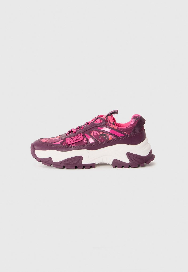 Purple and pink athletic shoes feature a textured pattern, breathable fabric, thick white midsole, and rubber outsole with tread.