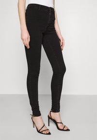 ONLY ONLBLUSH  - Calças de ganga de corte skinny - black denim