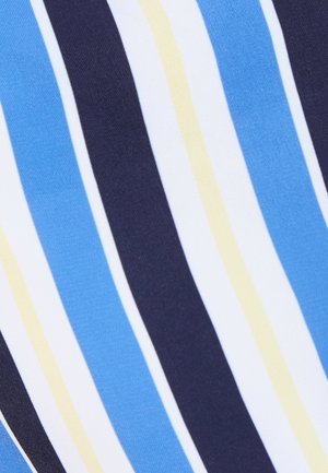 Strisce diagonali di tessuto in blu, blu navy, bianco e giallo pallido alternate in un motivo ripetuto.