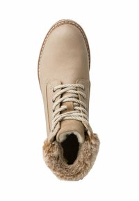 Beige ankelstövlar med foder av konstpäls, slät läderöverdel, rund tå, kontrasterande sömmar och tjocka snören.