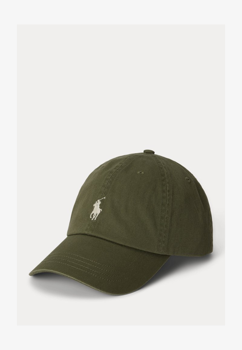 Oliiviroheline nokamüts tekstureeritud kangast, millel on kumer visiir ja vasakul esiküljel valge tikitud logo.