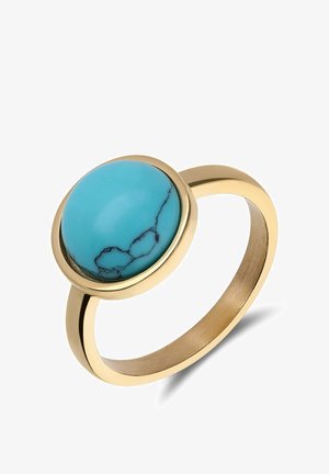 Gold band ring with a smooth, round turquoise stone featuring natural black veining set in a bezel setting.