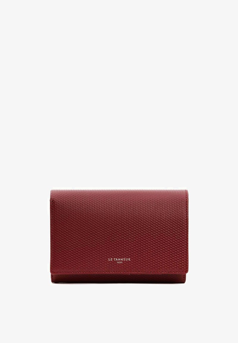 Red textured leather wallet with flap closure, featuring embossed pattern and logo detailing. Compact rectangular shape, minimalistic design.