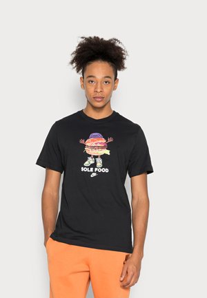 T-shirt con stampa - black