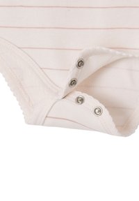 Striped bodysuit in soft beige fabric with light pink stripes. Features snap fasteners at the bottom and scalloped trim along the edges.