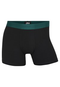 Svarta boxershorts i mjukt tyg, med en teal-färgad midjeband med präglad logotyp. Designen är kroppsnära och i midjehöjd.