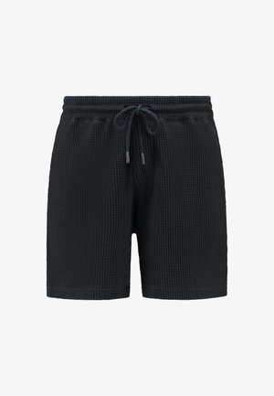 Črne teksturirane kratke hlače z vaflasto vzorcem, elastičnim pasom in vrvico. Ima stranske žepe; lahkotna zasnova je primerna za sproščeno nošenje.