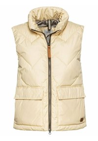 Polstret ærmeløs vest i lys beige med høj krave, frontlynlås, to store forlommer og en lille logoaccent på kanten.
