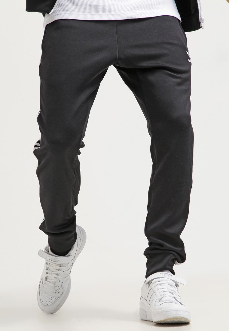 adidas Originals SUPERSTAR - Trainingsbroek - black/Zwart - Zalando.nl