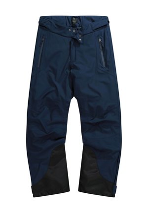 Pantaloni impermeabili della marina con vita regolabile, tasche con zip e dettagli neri alle caviglie per una maggiore durata e protezione.