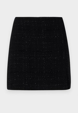 Black mini skirt made of textured fabric with a subtle glitter pattern, featuring a straight cut and a waistband at the top.