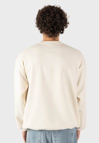 Kaotiko PARTY UNISEX - Sudadera - ivory