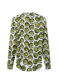 Camicia bianca a maniche lunghe con grandi motivi circolari astratti verdi e neri, con polsini abbottonati e colletto classico, vista da dietro.