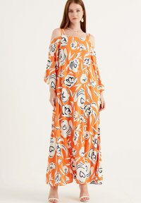Herita Maxikjoler - orange