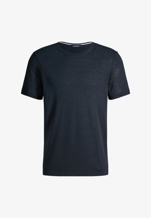 Męski granatowy t-shirt z krótkim rękawem i okrągłym dekoltem, o gładkiej fakturze i małą metką marki wewnątrz kołnierza.