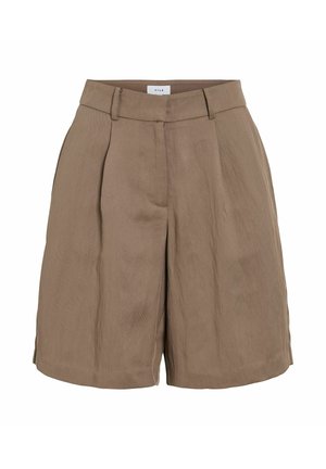 Kõrge vöökohaga pruunid kohandatud lühikesed püksid vööaasade, eessete voltide ja varjatud esilukuga.